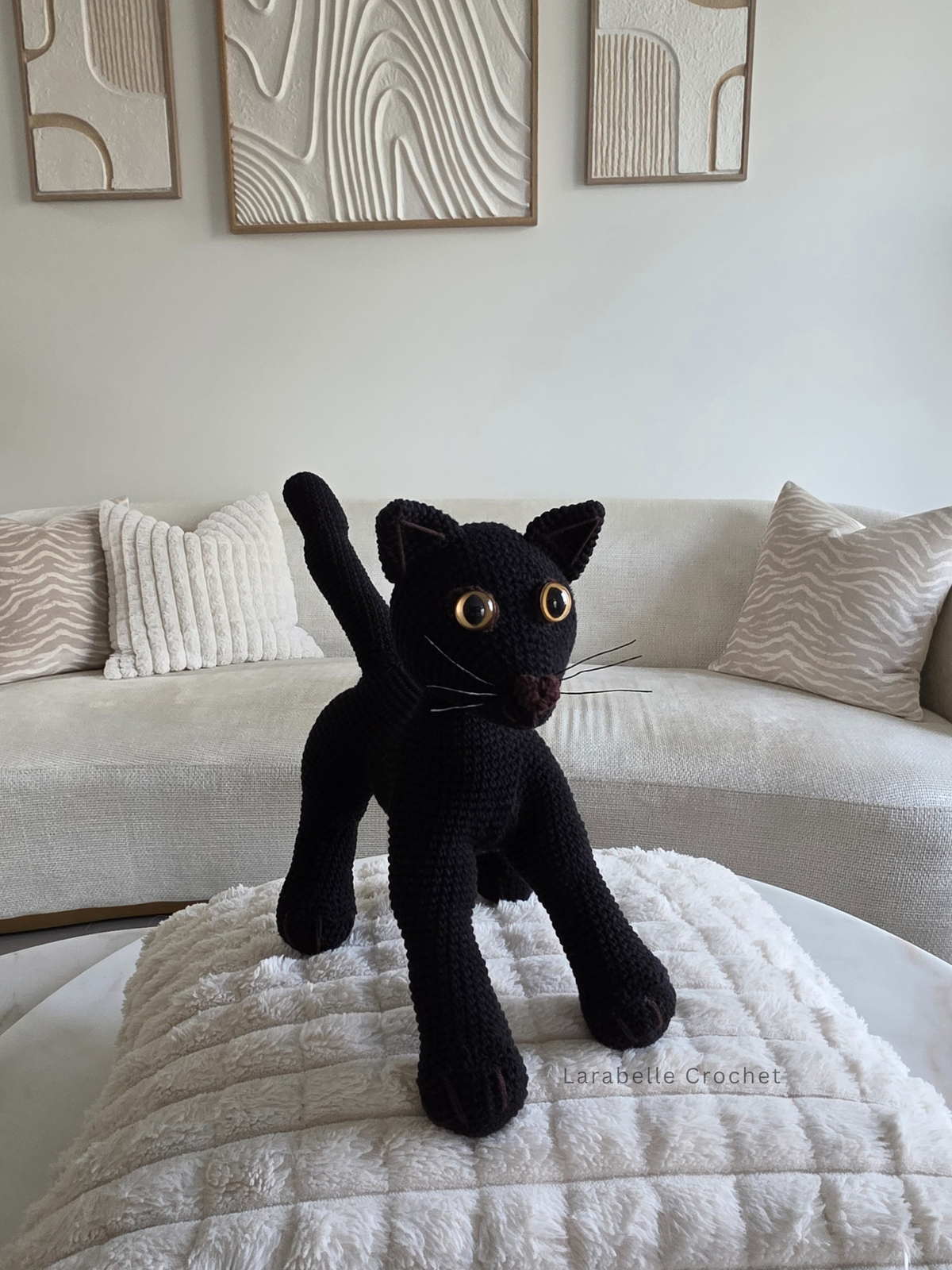 Top angled view of black cat crochet amigurumi