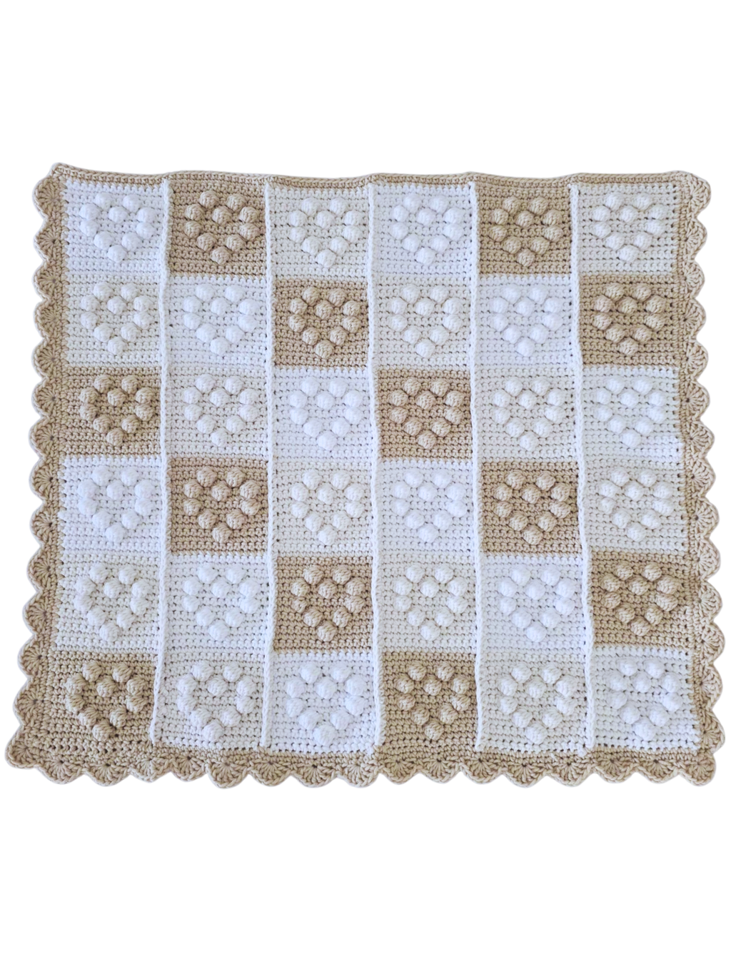 Full view of crochet baby blanket featuring small hearts in a patchwork grid of 6 x 6.